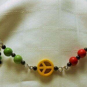 No 226 Handmade necklace with polished stones and Peace sign